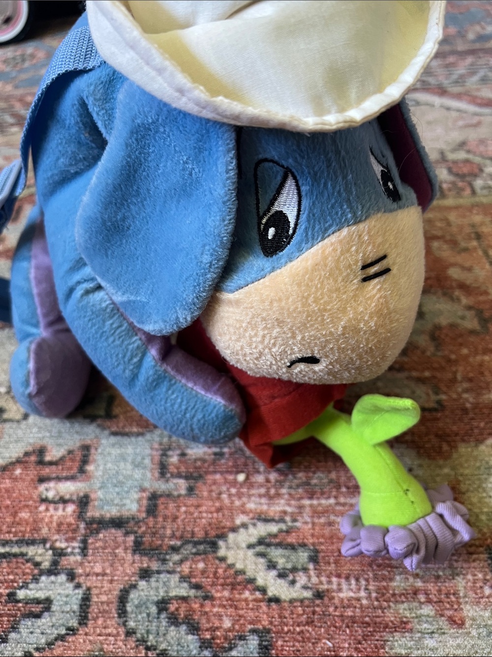 Disney Eeyore Plush Blue Purple Tan with Green Flower